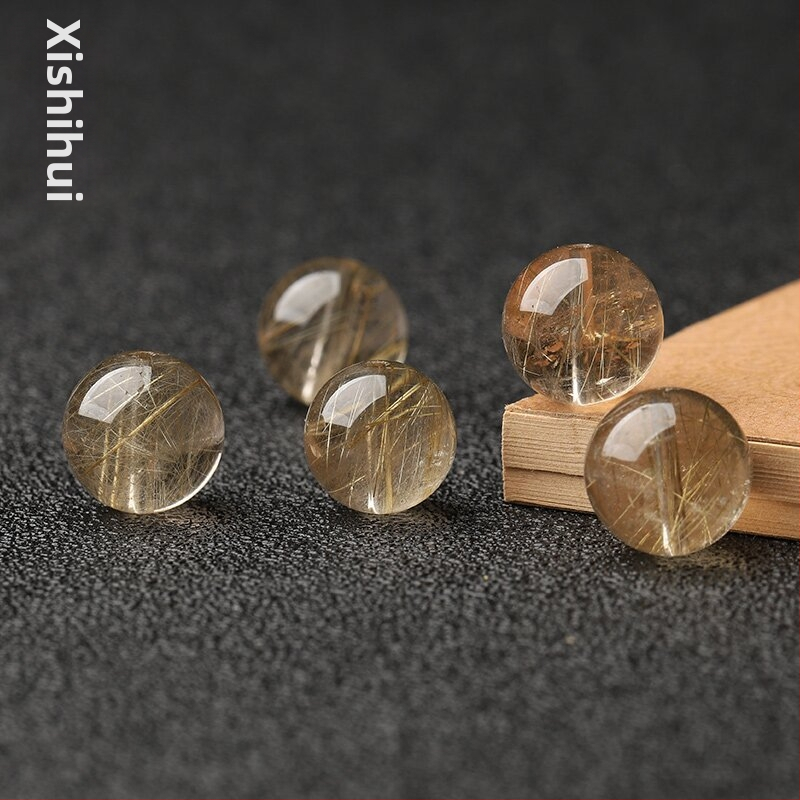 Prírodné brazílske zlaté kryštálové guľôčky — voľné korálky, brúsenie a leštenie, materiál: zlatý kryštál, vydanie jar 2025