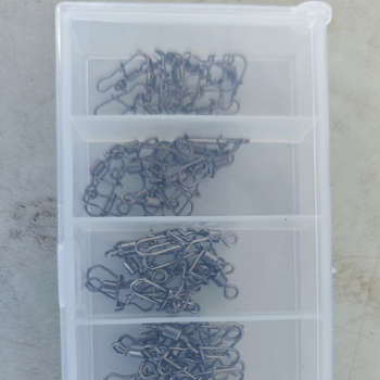 Pino rinkinys su Amerikos stiliaus pasukimo patobulinimu jūrų žvejybai