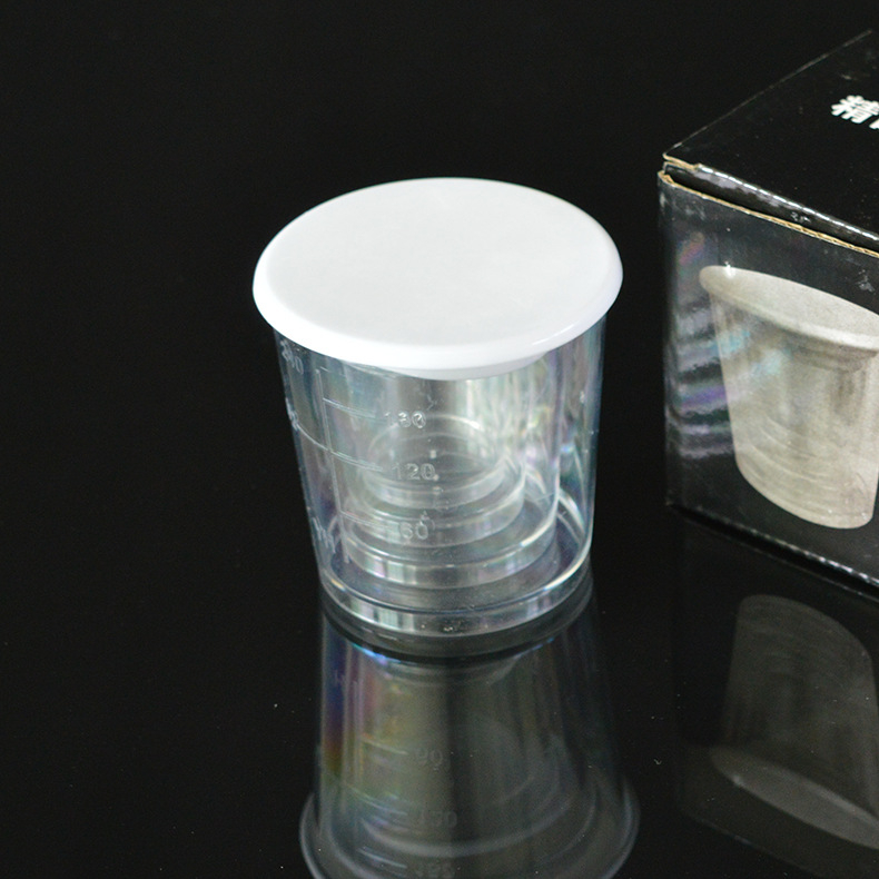Četiri u jednome set mjerne čašice od smole s poklopcem, kapaciteti 240 ml, 120 ml, 60 ml i 30 ml, plastične s gradacijom.