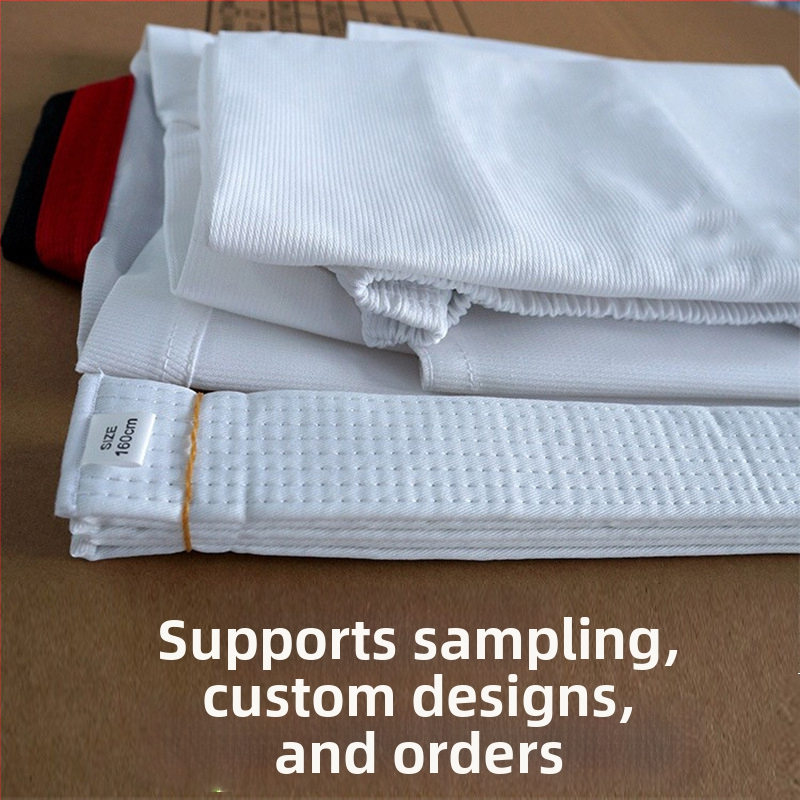 Taekwondo uniforma (vienkrāsains raksts, poliestera-kokvilnas audums, oderes kokvilnas maisījums, izcelsme: Qingdao, Šandongas reģions)