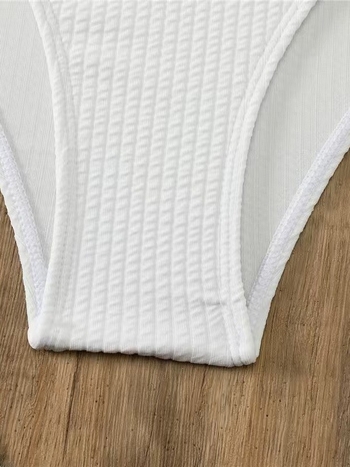 Dvije dijelni bikini s halterom, sexy bez leđa; materijal: poliester 82% + elastan 18%; podstava: elastan 18%