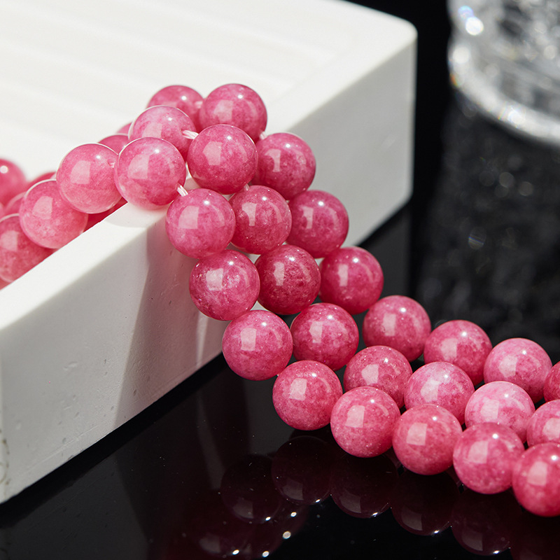 Kiegészítők: chalcedon gömbölyű gyöngyök, polírozott, nemes mintázat