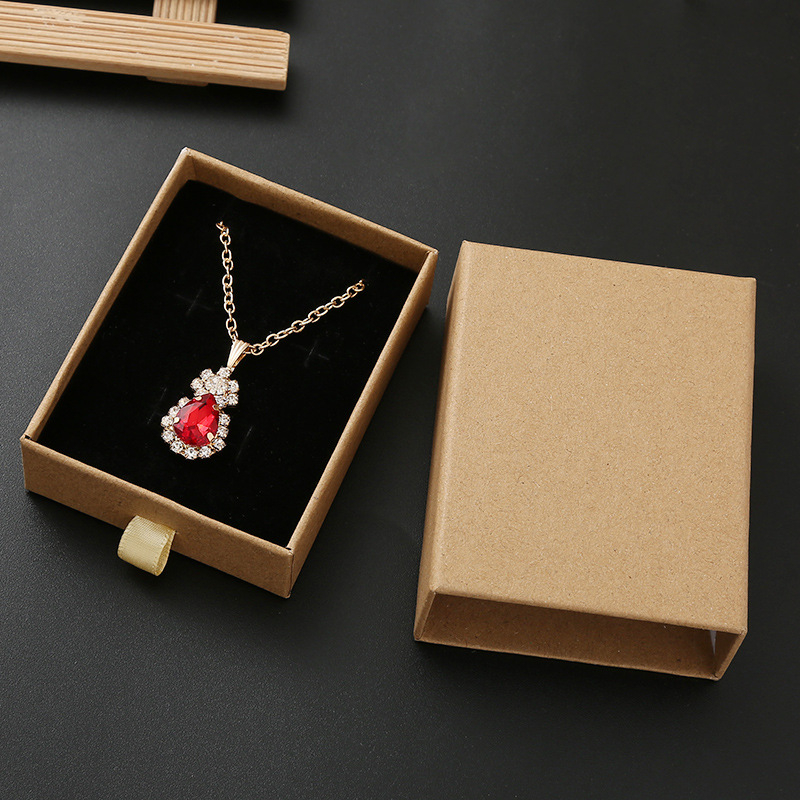 Kraftpapīra juvelieru kārba ar atvilktni un putu ievietojumu auskariem, gredieniem un kaklarotām