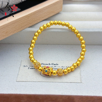 Narukvica s šupljim filigranskim perlicama sreće, pozlaćeni bakar, elektrolitska završna obrada, ženski nakit za ruku