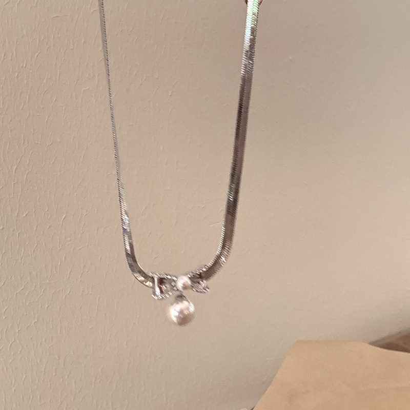 JUNORS Kézzel készített nyaklánc mesterséges kristályokkal, masni gyöngy rész, kígyócsont lánc, ötvözet medál – geometriai dizájn nőknek