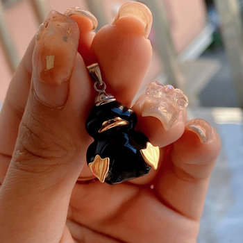 Медальон с форма на патица от сребро 925, с естествен обсидиан вграден