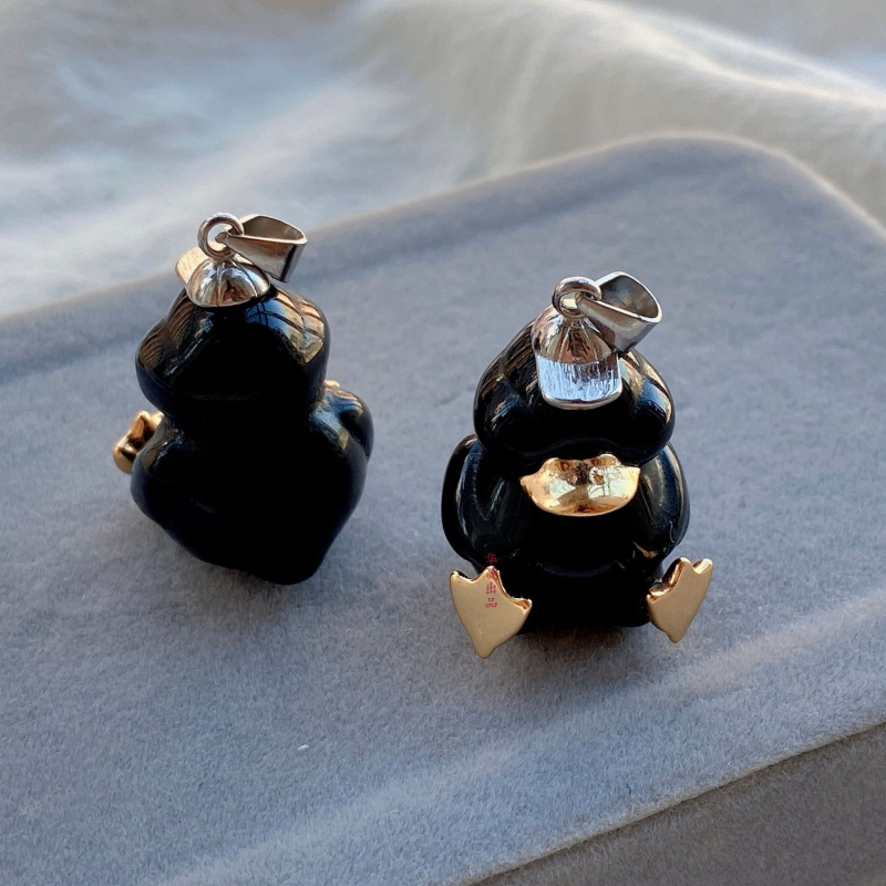 Медальон с форма на патица от сребро 925, с естествен обсидиан вграден