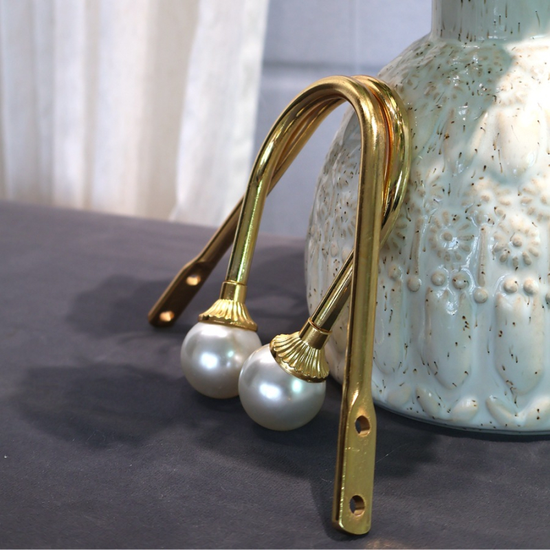 U formos perlų galvos sieninis kabliukas užuolaidoms ir striukėms, kietas geležis, paprastas ir modernus stilius.