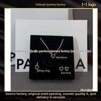 Trodjelni set nakita: naušnice, ogrlica i narukvica, križni lanac, privjesak od bakra, srebrni premaz, motivi srce/kapljica/zvončić, proljeće 2025