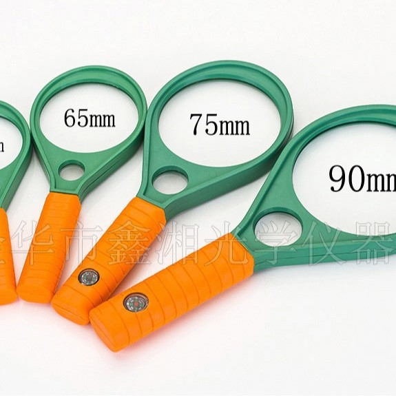 90 mm-es kétlencsés nagyító kompassz funkcióval, teniszütő-stílusú műanyag kivitel