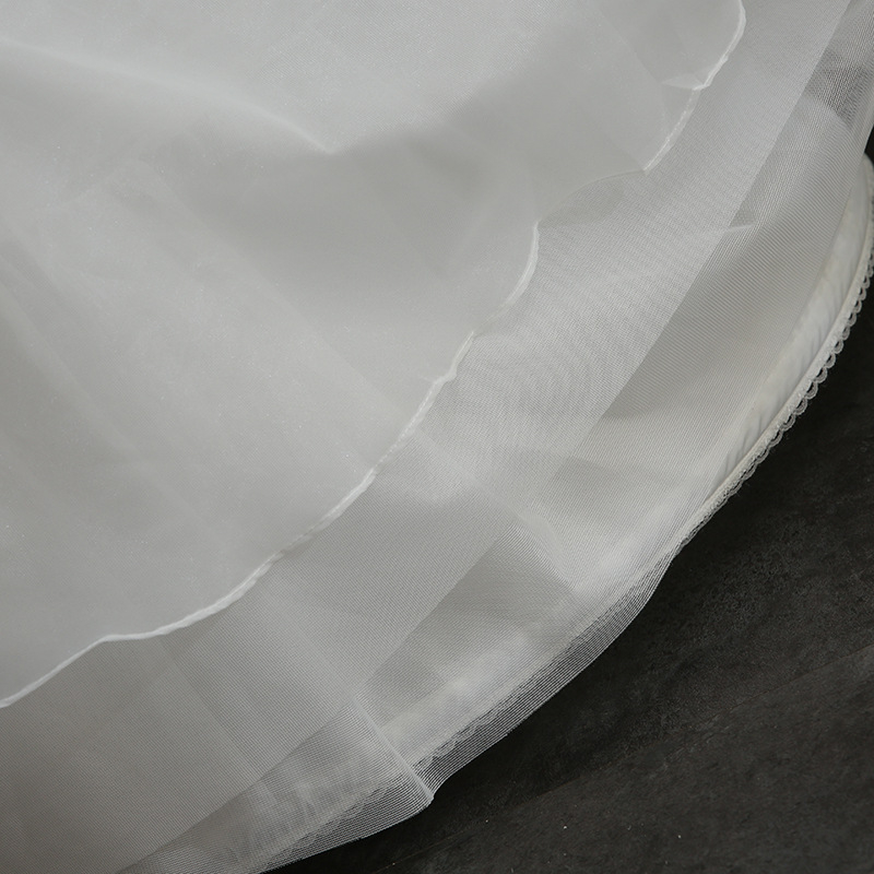 Νυφικό από οργάνζα με τρεις μεταλλικούς δακτυλίους και διπλό όγκο φούστας — Μάρκα Force Source; Ηλικία: Ενήλικες; Σεζόν: Καλοκαίρι 2021; Σειρά: Force Source