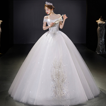 Egyrészes vállnélküli menyasszonyi ruha, organza anyag, hosszú szoknya, középmagas derék, 90% poliészter