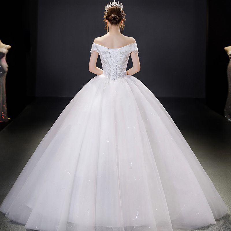 Egyrészes vállnélküli menyasszonyi ruha, organza anyag, hosszú szoknya, középmagas derék, 90% poliészter