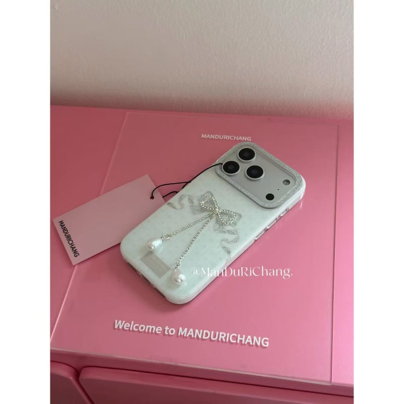 iPhone vāciņš ar korejiešu iedvesotu 3D rhinestone loku un ziedu dizainu, silikona matēts virsmas, kritiena aizsardzība