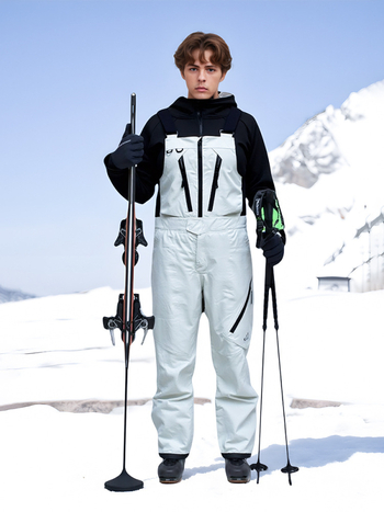 Unisex set jakne i hlača za skijanje, široka kroj, vodootporan i topao za zimske sportove.