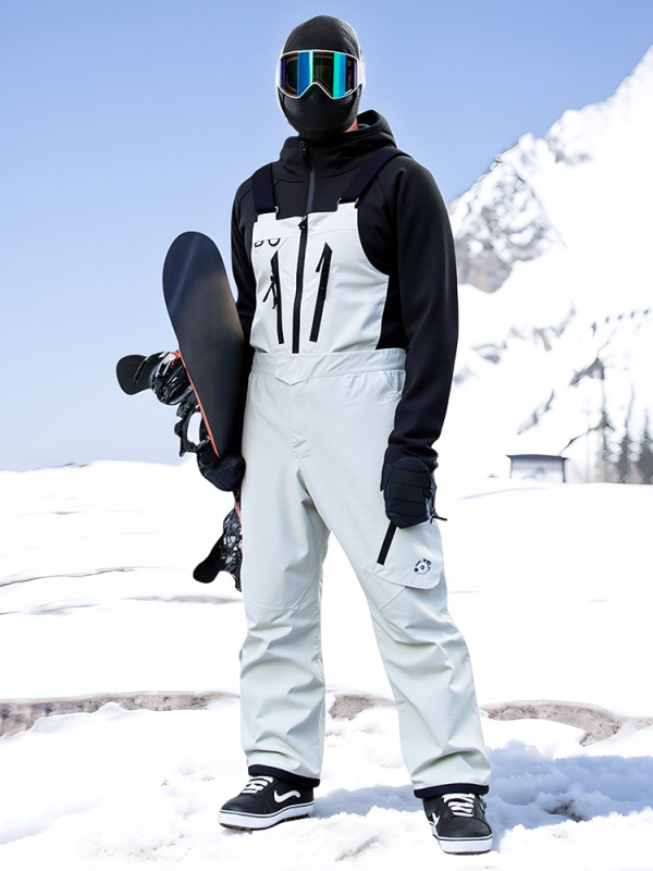 Unisex set jakne i hlača za skijanje, široka kroj, vodootporan i topao za zimske sportove.