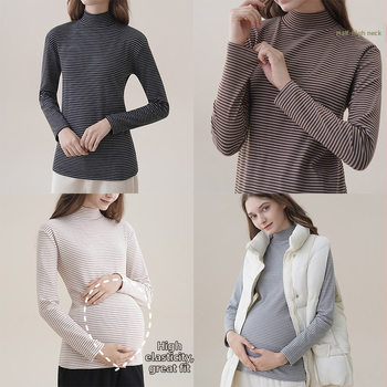 Nėštiesiems skirtas pagrindinis tops su gobtuvu, pusaukšto kaklo, ilgos rankovės, tiesus siluetas, vidutinio ilgio, poliesterio-elastano mišinys