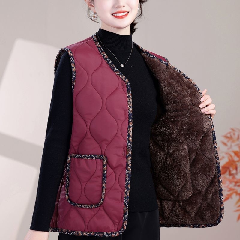 Жилетка с вълнен пълнеж, V-образно деколте, ултра-къс модел, основна тъкан: rayon (95%+), тъкан от овча вълна