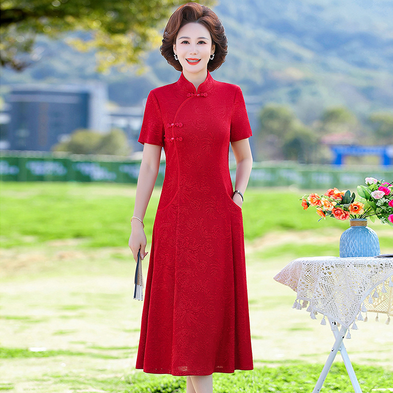 Ženska haljina s Tencel mješavinom (70-80%) i poliestera (30-50%), midi duljina, A-silueta, stojeći ovratnik, kratki rukavi