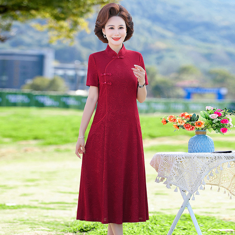 Ženska haljina s Tencel mješavinom (70-80%) i poliestera (30-50%), midi duljina, A-silueta, stojeći ovratnik, kratki rukavi