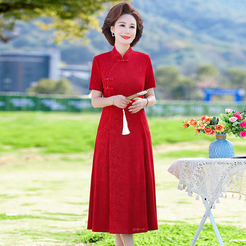 Ženska haljina s Tencel mješavinom (70-80%) i poliestera (30-50%), midi duljina, A-silueta, stojeći ovratnik, kratki rukavi