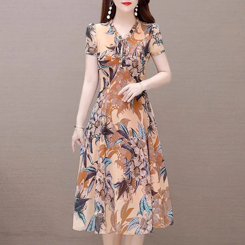 Cvjetna midi haljina s V-izrezom, kratkim rukavima, srednjim strukom, ljeto 2023