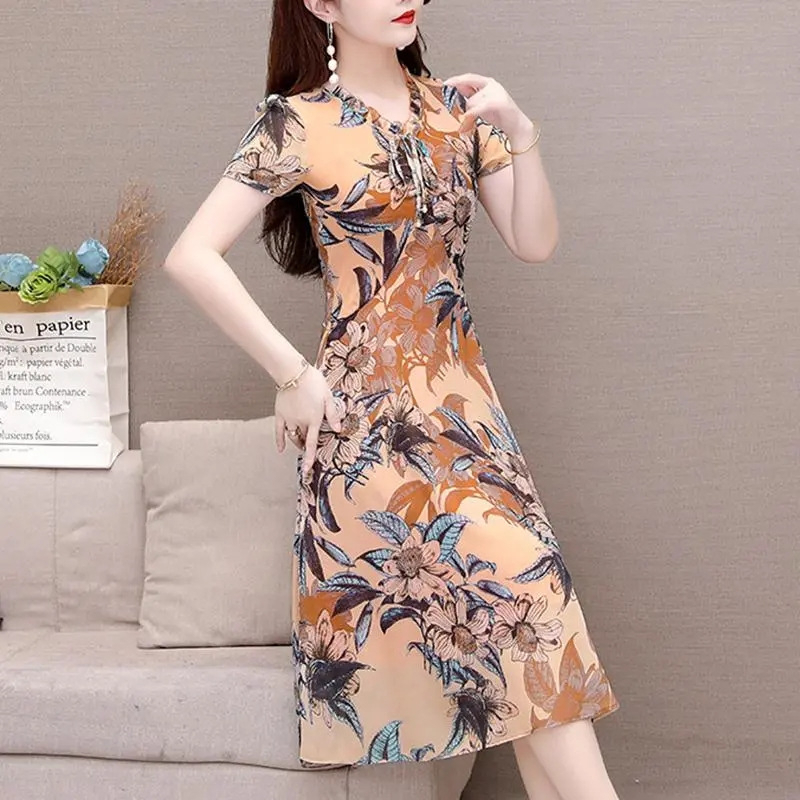 Cvjetna midi haljina s V-izrezom, kratkim rukavima, srednjim strukom, ljeto 2023