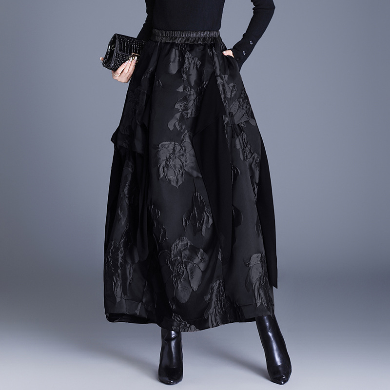 Пола дълга с неравна кройка, жакардова полиестерова материя, елегантен офис стил, съдържание полиестер 30–50%, микроеластичност (есен 2025)