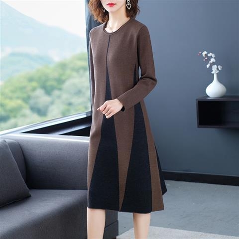 Haljina A-linije, midi duljine, polu-visoki ovratnik, dugi rukavi, slobodan struk, smjesa viskoze i poliester, elegantan uredski stil