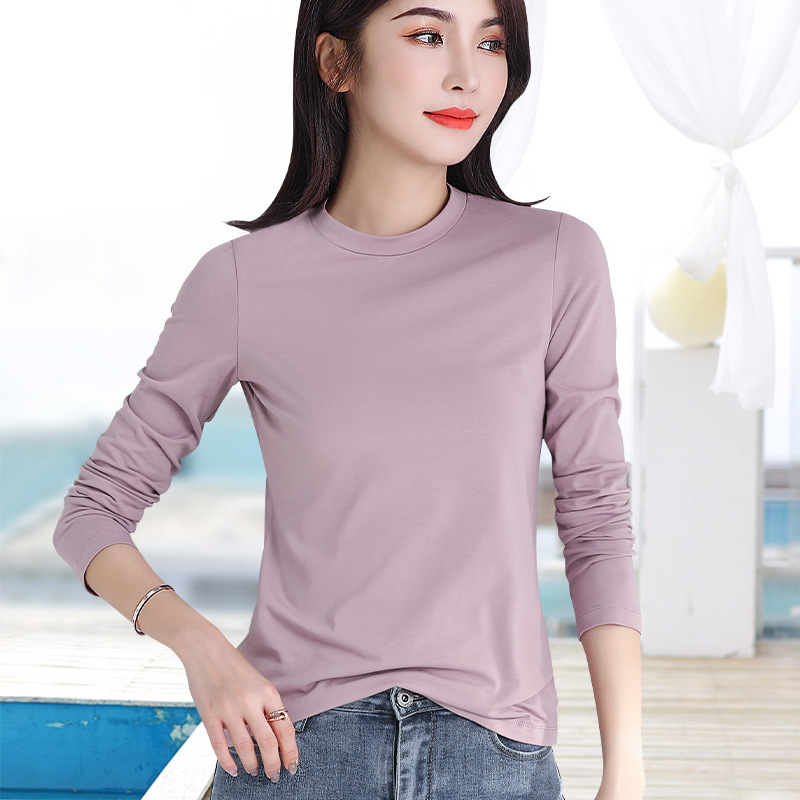 Tricou din bumbac cu mâneci lungi, croială slim, guler semi‑înalt, culoare solidă, lungime standard