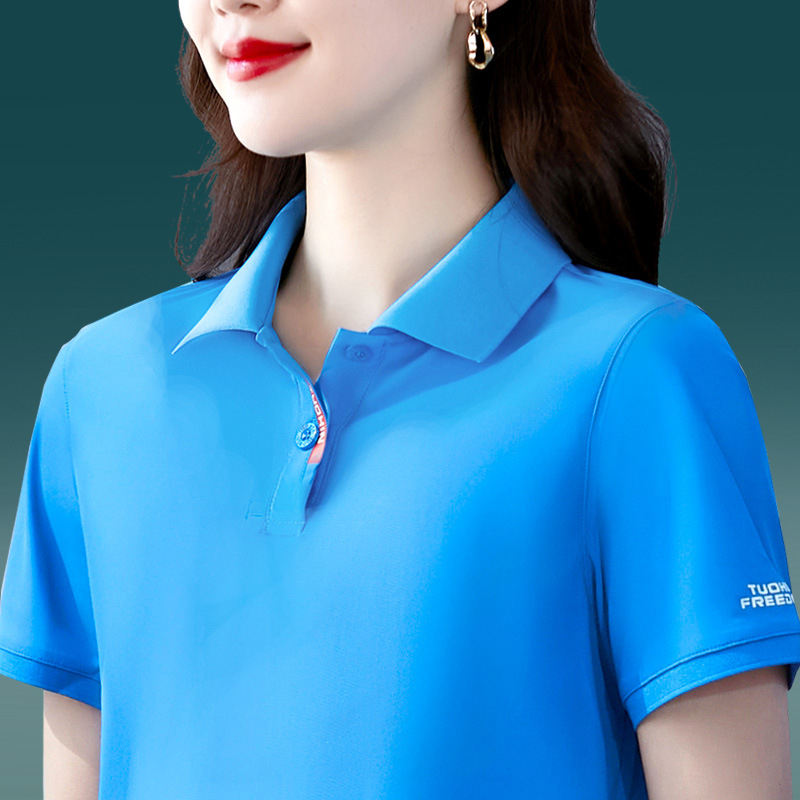 Tricou polo damă cu guler polo, mâneci scurte, lungime ultra scurtă (polieester 70–80%)