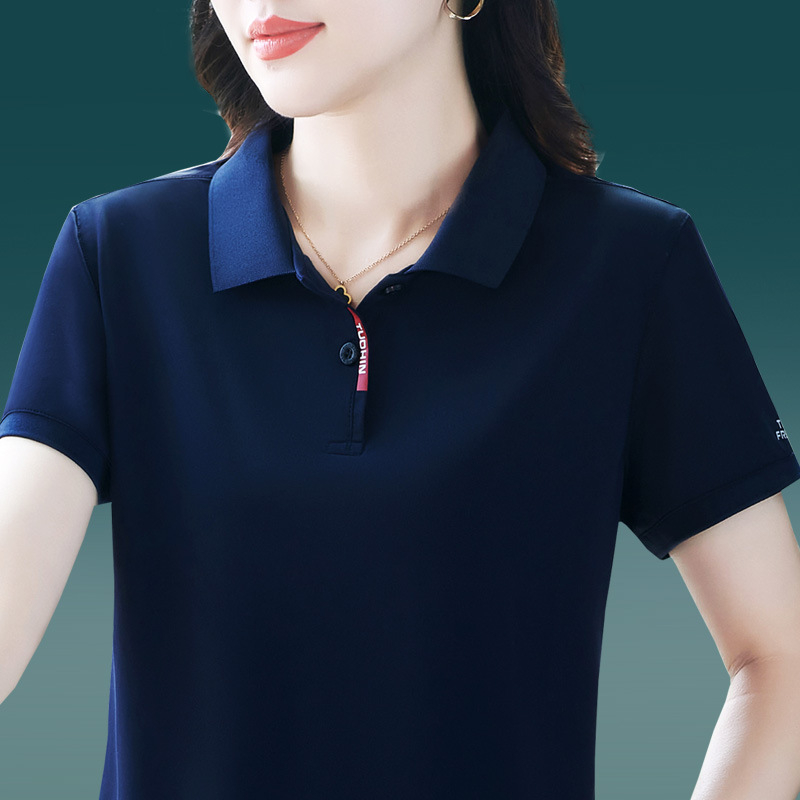 Tricou polo damă cu guler polo, mâneci scurte, lungime ultra scurtă (polieester 70–80%)