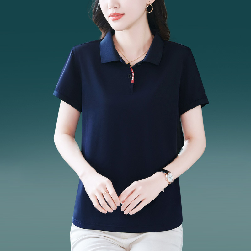 Tricou polo damă cu guler polo, mâneci scurte, lungime ultra scurtă (polieester 70–80%)