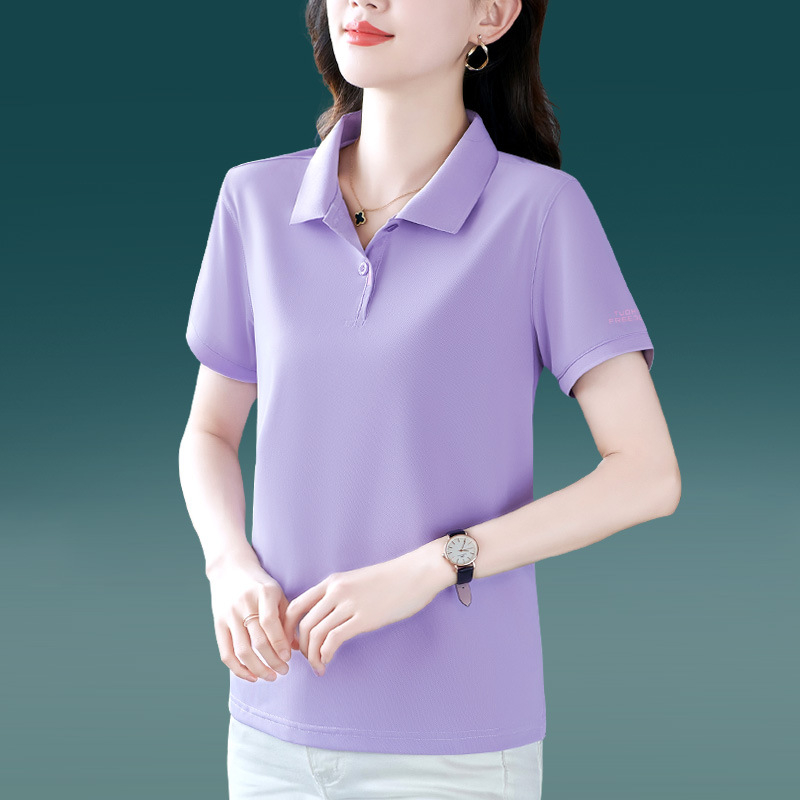 Tricou polo damă cu guler polo, mâneci scurte, lungime ultra scurtă (polieester 70–80%)