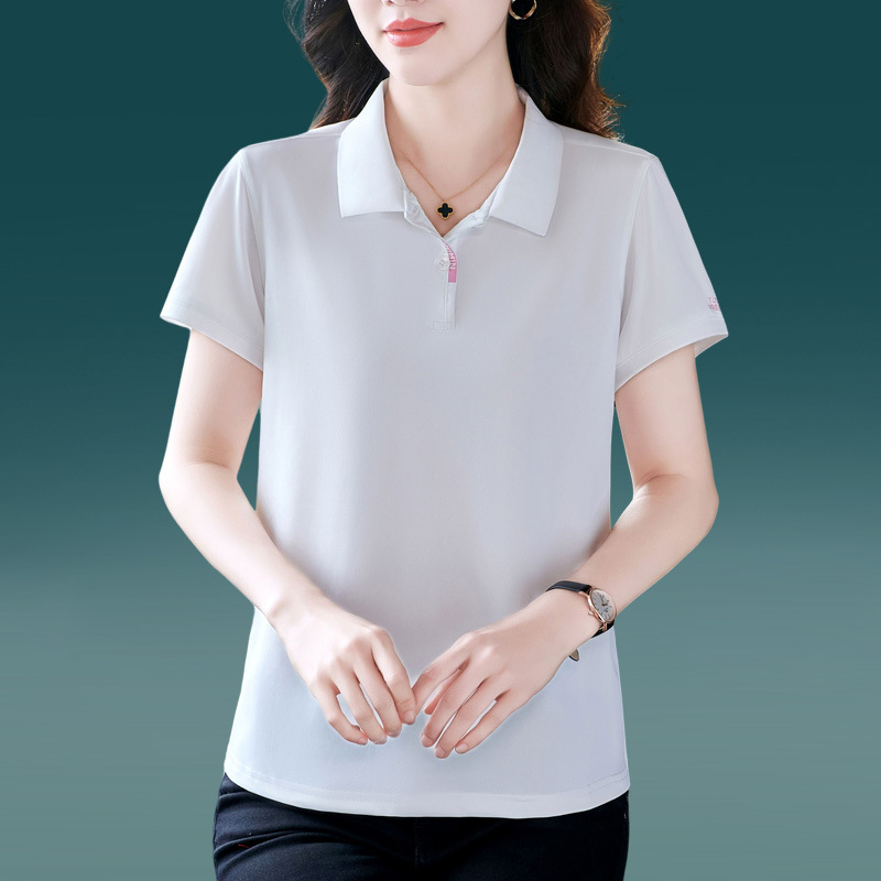 Tricou polo damă cu guler polo, mâneci scurte, lungime ultra scurtă (polieester 70–80%)