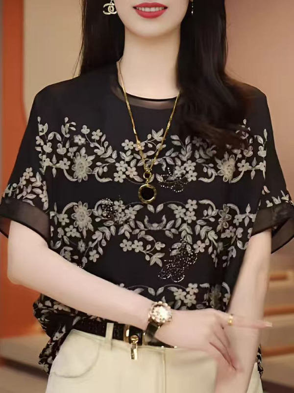 Plus-suurusega lühikeste varrukatega topp, ümmarguse kaelusega, killustatud lillemustriga, polüester 90–95% + 70–80%, kristallide detailid, pikkus ≤40 cm