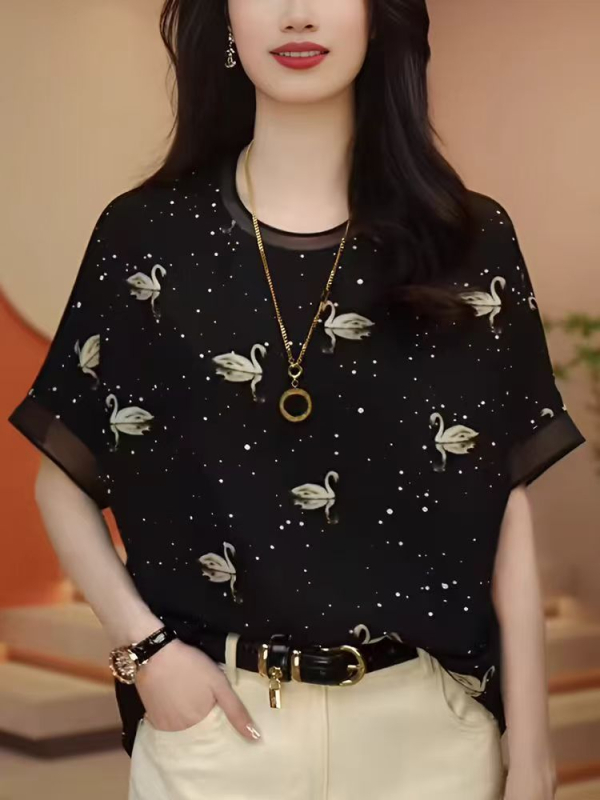 Plus-suurusega lühikeste varrukatega topp, ümmarguse kaelusega, killustatud lillemustriga, polüester 90–95% + 70–80%, kristallide detailid, pikkus ≤40 cm