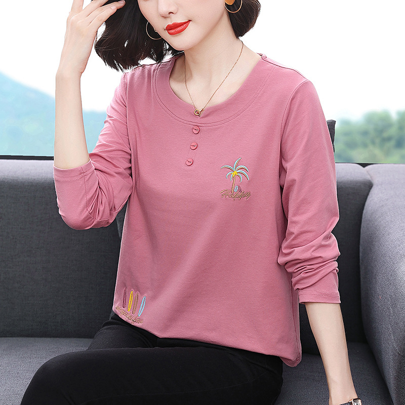 Naiste puuvillase ja polüesteri segust T-särk, lühikeste käistega, V-kaelusega, ühtne muster, pikkus 50–65 cm, kontoristiil