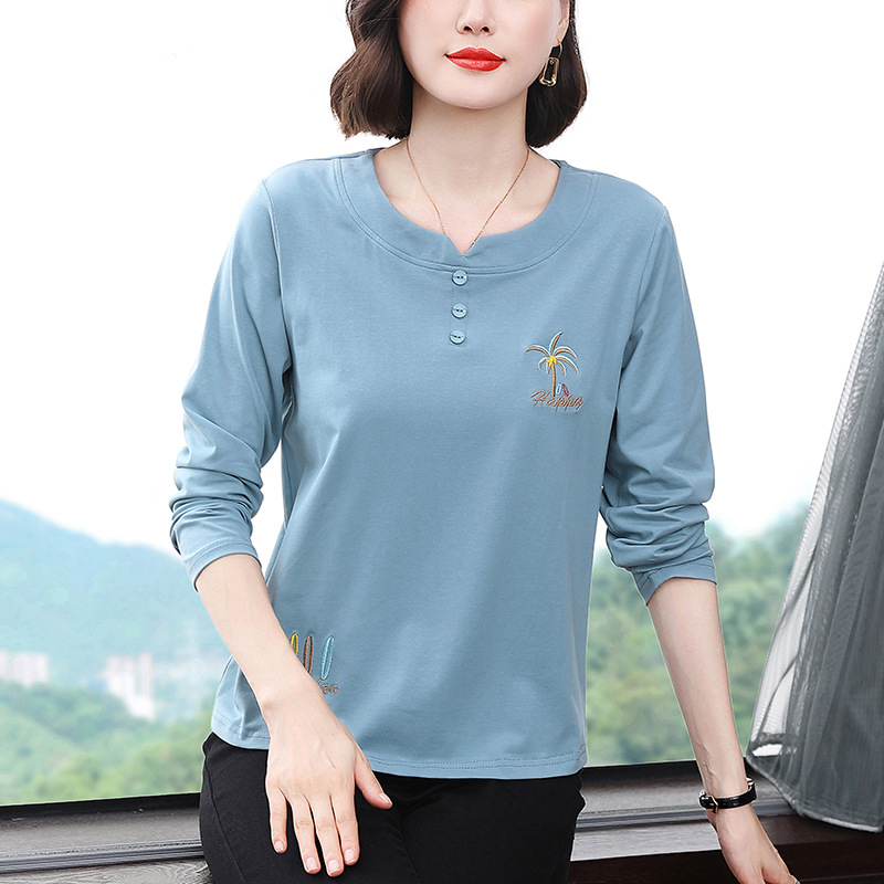 Naiste puuvillase ja polüesteri segust T-särk, lühikeste käistega, V-kaelusega, ühtne muster, pikkus 50–65 cm, kontoristiil