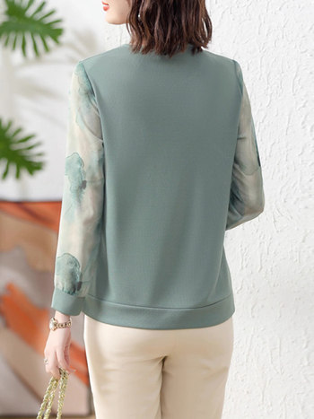 Igapäevane kootud pikkade varrukatega top, ümmarguse kaelusega, tikandiga, polüesterkiududest kangas >95% sisaldusega, kevad-2025 kollektsioon