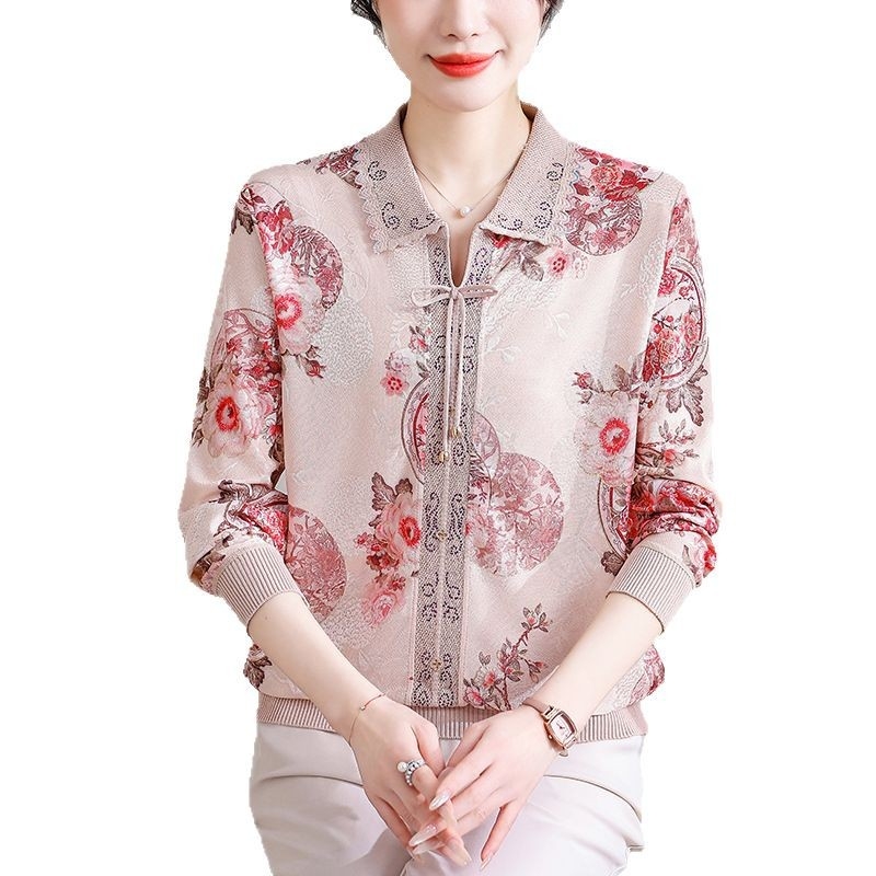 Moteriška palaidinė su ilgomis rankovėmis ir apykakle tipo lapel, iš ice silk audinio, kuriame daugiau nei 95% poliesterio; augalinis raštas, kinų stilius.