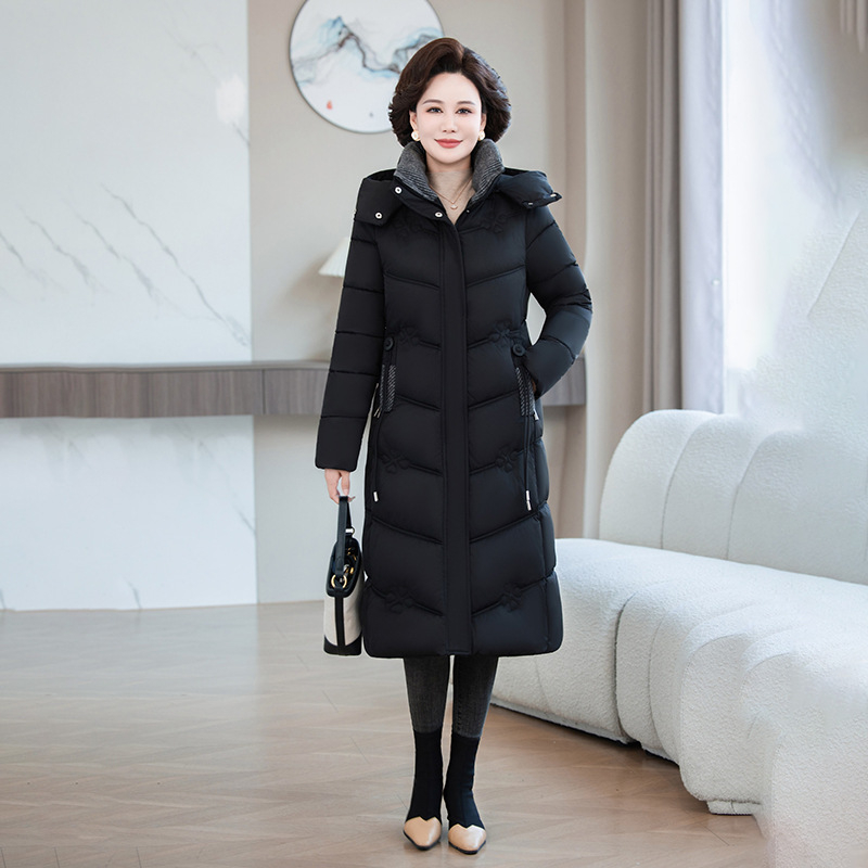 Ženski zimski kaput s punjenjem od imitacije svile i pamuka, uski kroj, srednja dužina, zatvaranje na zip, zima 2025