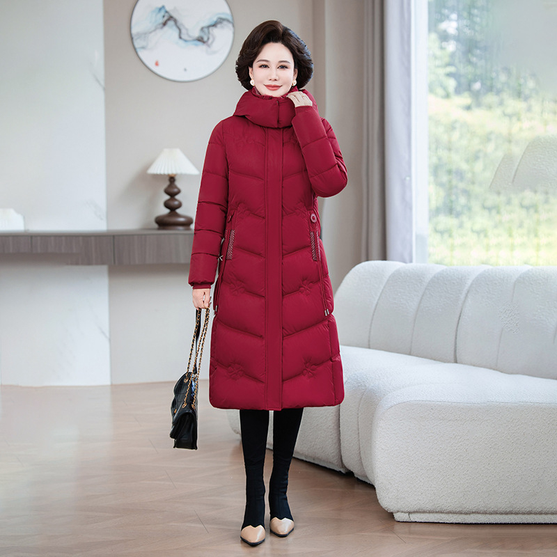 Ženski zimski kaput s punjenjem od imitacije svile i pamuka, uski kroj, srednja dužina, zatvaranje na zip, zima 2025
