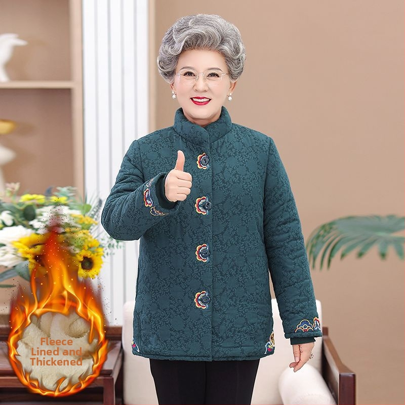 Dámska vyteplená bunda s polo golierom, voľný strih, stredná hrúbka, TR tkanina na PVC podklade, výplň z imitácie hodvábu a bavlny.