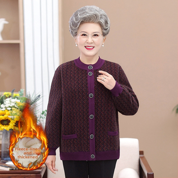 Flisinį pamušalą turintis kardiganas vidutinio amžiaus ir vyresniems, gėlių raštas, poliesterio–spandeks mišinys, vidutinio ilgio 50–65 cm, flokavota audinys