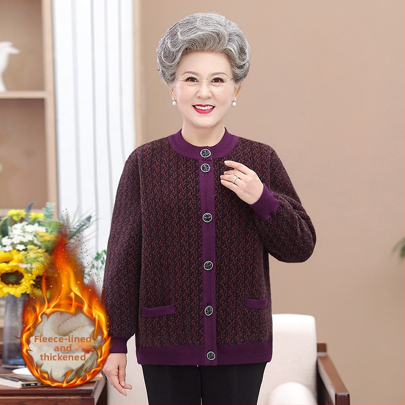 Flisinį pamušalą turintis kardiganas vidutinio amžiaus ir vyresniems, gėlių raštas, poliesterio–spandeks mišinys, vidutinio ilgio 50–65 cm, flokavota audinys