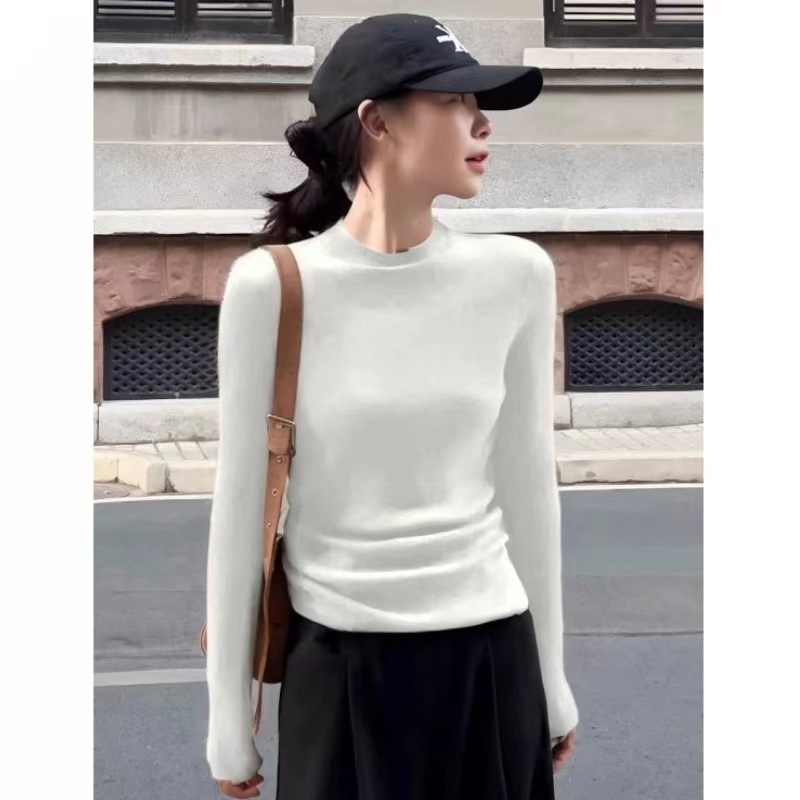 Ženski pulover od vunene smjese, uski kroj, polovično visok ovratnik, dugi rukavi, jesen 2024