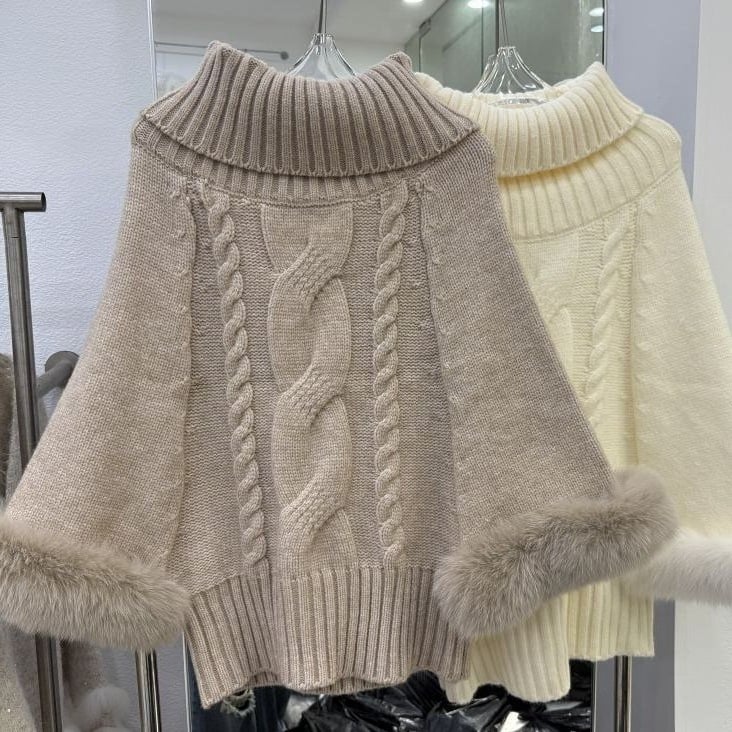 Női laza szabású pulóver magas gallérral, egyszínű kötésből, juh gyapjúból