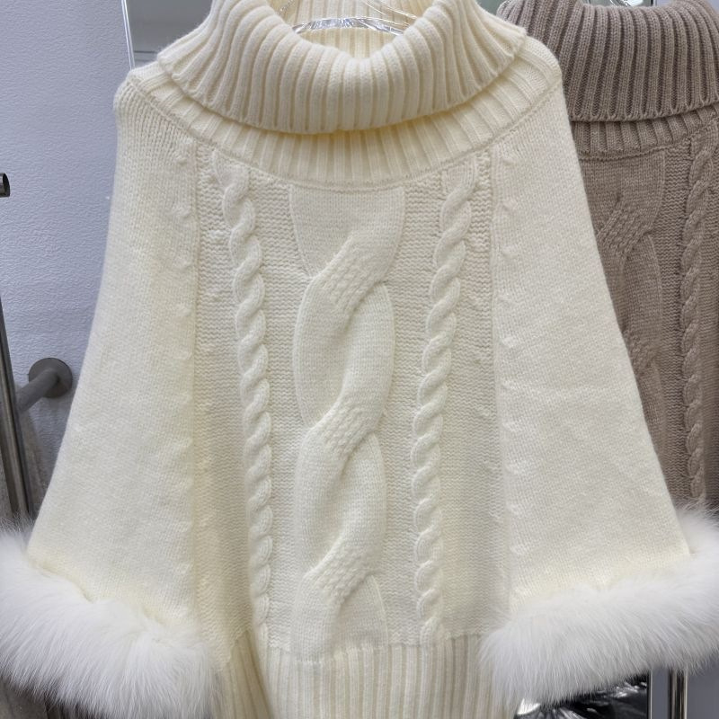 Női laza szabású pulóver magas gallérral, egyszínű kötésből, juh gyapjúból