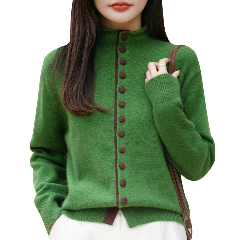 Dámsky pletený kardigán so stojacím golierom, jednosezové zapínanie na gombík, voľný strih, dlhé rukávy, obsah kožušiny z zajaca do 30%.